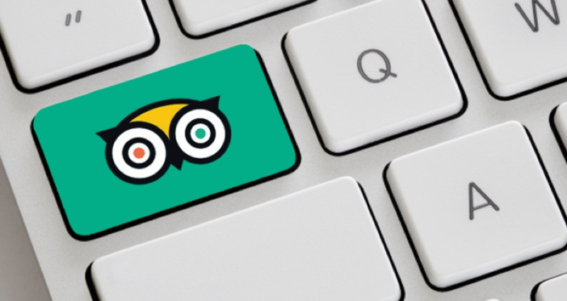 Clavier blanc avec le logo de Tripadvisor